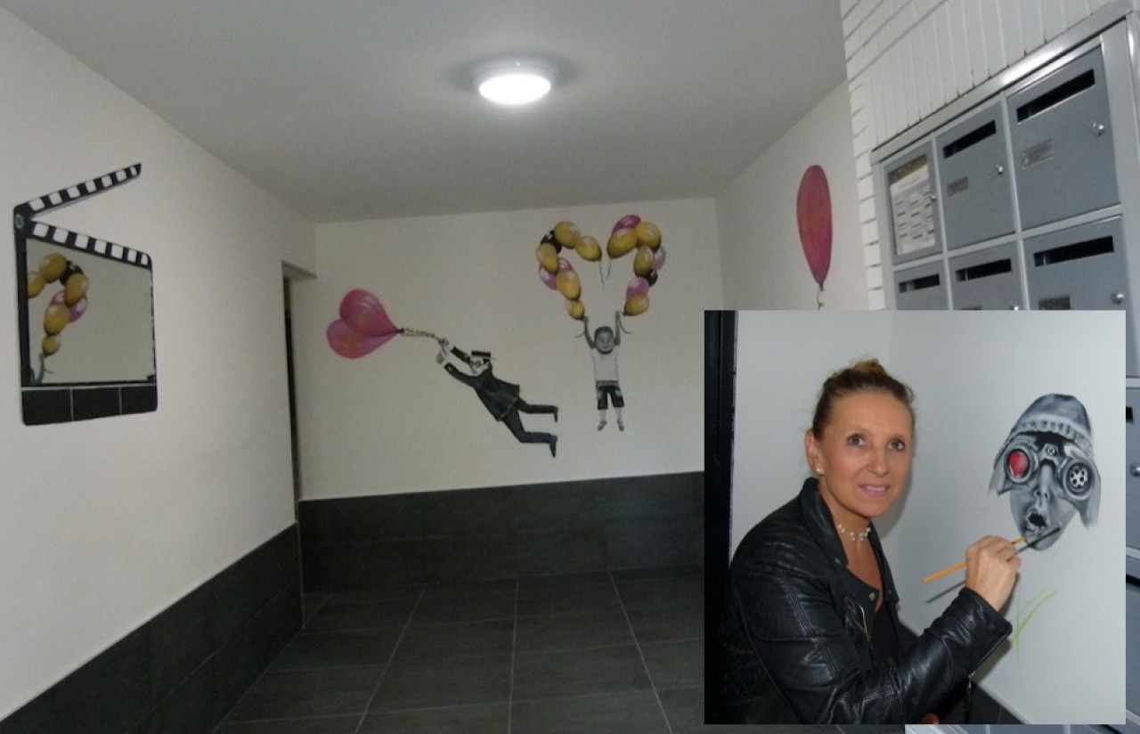 Véronique Barrillot, peintre muraliste a décoré onze halls de bâtiments à Talant, dans l'agglomération de Dijon, en y associant les habitants.